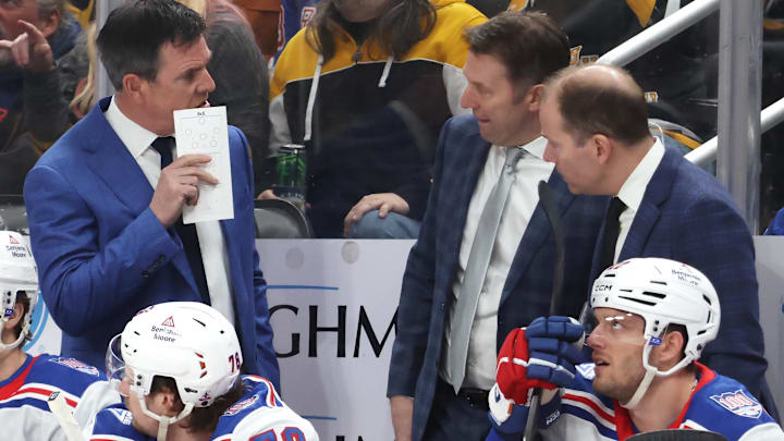 Jan 31, 2026; Pittsburgh, Pennsylvania, USA;  New York Rangers head coach Mike Sullivan (left) talks with assistant coaches Joe Sacco (middle) and Ty Hennes (right) against the Pittsburgh Penguins during the second period at PPG Paints Arena. Mandatory Credit: Charles LeClaire-Imagn Images