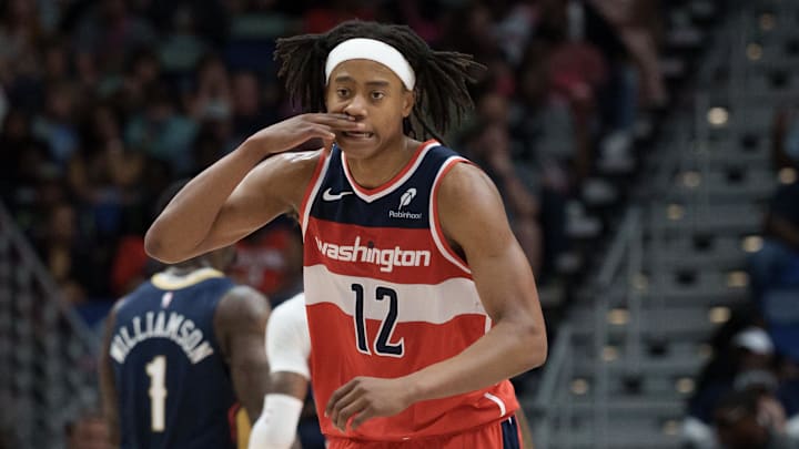Mar 8, 2026; New Orleans, Louisiana, USA;  Washington Wizards guard Tre Johnson (12) reacts after a three-point basket against the New Orleans Pelicans during the second half at Smoothie King Center. Mandatory Credit: Matthew Hinton-Imagn Images