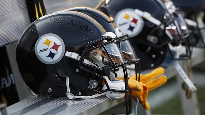 Aug 9, 2024; Pittsburgh, Pennsylvania, USA;  Pittsburgh Steelers helmets on the bench during the game against the Houston Texans during the first quarter at Acrisure Stadium. Mandatory Credit: Charles LeClaire-Imagn Images