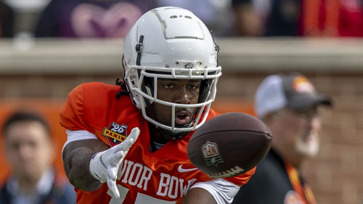 Jan 28, 2025; Mobile, AL, USA; American team wide receiver Jalen Royals of Utah State (17) tracks down a pass during Senior Bowl practice for the American team at Hancock Whitney Stadium. Mandatory Credit: Vasha Hunt-Imagn Images