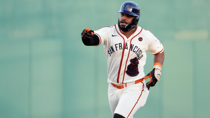 Jun 20, 2024; Fairfield, Alabama, USA; San Francisco Giants outfielder Heliot Ramos (17) rounds the bases after hitting a home run during the 3rd inning against the St. Louis Cardinals in the MLB at Rickwood Field tribute game to the Negro Leagues. Rickwood Field is the oldest baseball stadium in America
