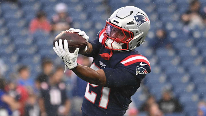 August 8, 2024; Foxborough, MA, USA;  New England Patriots running back Antonio Gibson (21) warms up before a game against the Carolina Panthers at Gillette Stadium.