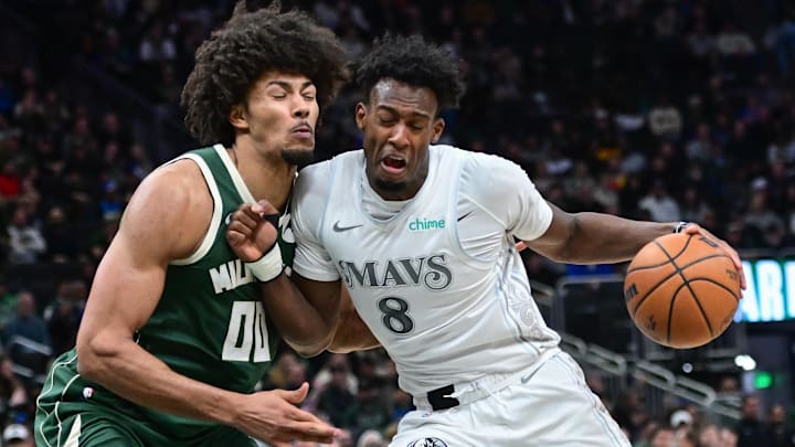 Mar 5, 2025; Milwaukee, Wisconsin, USA; Dallas Mavericks forward Olivier-Maxence Prosper (8) drives for the basket against Milwaukee Bucks center Jericho Sims (00) in the third quarter at Fiserv Forum. Mandatory Credit: Benny Sieu-Imagn Images Mar 5, 2025; Milwaukee, Wisconsin, USA; Dallas Mavericks forward Olivier-Maxence Prosper (8) drives for the basket against Milwaukee Bucks center Jericho Sims (00) in the third quarter at Fiserv Forum. Mandatory Credit: Benny Sieu-Imagn Images