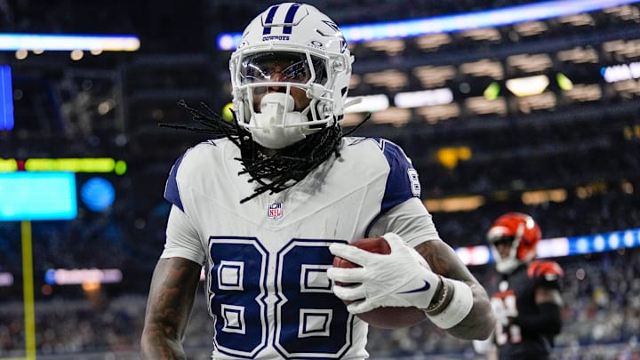 Dallas Cowboys wide receiver CeeDee Lamb (88) makes a touchdown over the Cincinnati Bengals in the first quarter during Monday Night Football at AT&T Stadium.