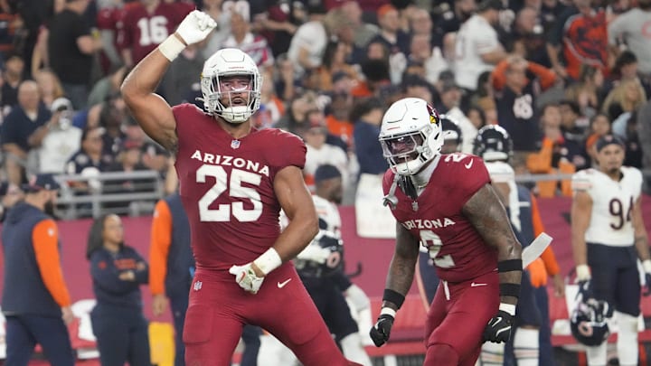 Arizona Cardinals linebacker Zaven Collins (25) celebrates a sack with linebacker Mack Wilson Sr. (2) against the Chicago Bears during the fourth quarter at State Farm Stadium on Nov 3, 2024, in Glendale.