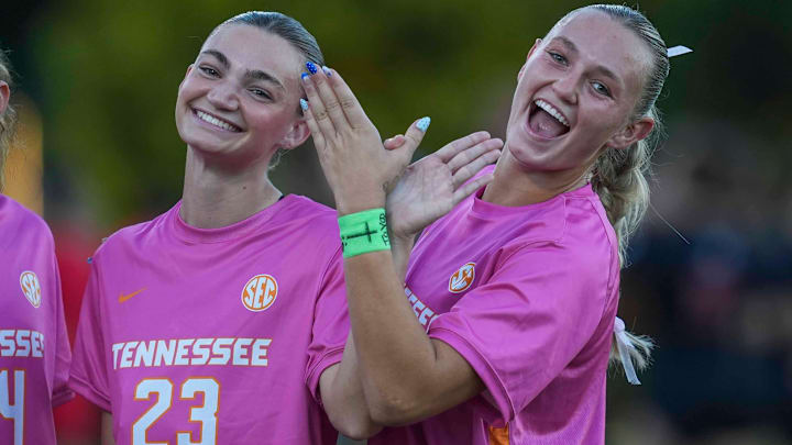 Tennessee midfielder Dakota Brown (23) and Tennessee forward Kate Runyon (7) make a butterfly with their hands during a NCAA soccer game between Tennessee and Georgia at Regal Soccer Stadium in Knoxville, Tennessee on October 2, 2025.