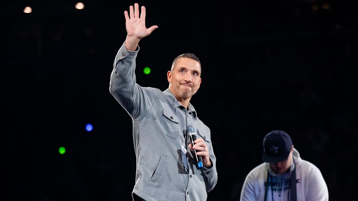 Penn State football coach Matt Campbell waves to the crowd during a Big Ten wrestling dual meet against Nebraska.