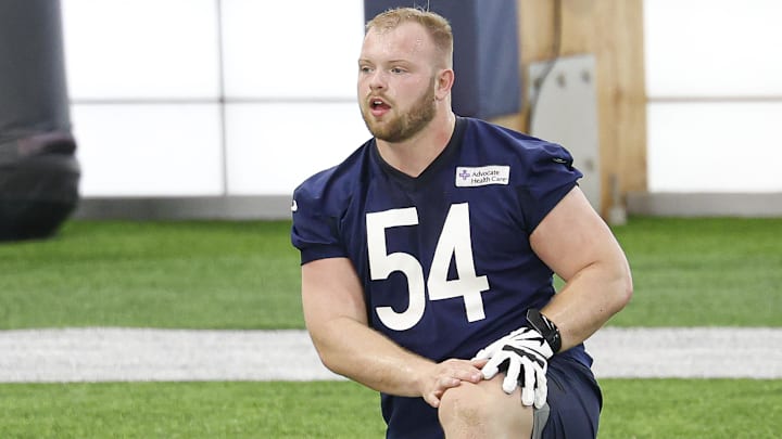 May 8, 2026; Lake Forest, IL, USA; Chicago Bears offensive lineman Logan Jones (54) stretches during Rookie Minicamp at Halas Hall. Mandatory Credit: Kamil Krzaczynski-Imagn Images