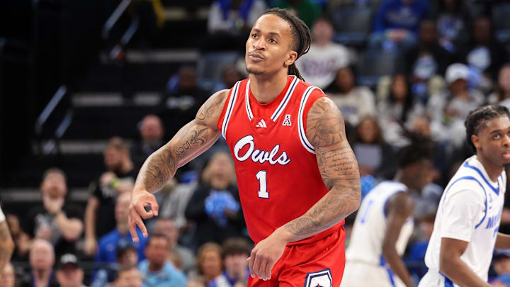 Feb 23, 2025; Memphis, Tennessee, USA; Florida Atlantic Owls forward Kaleb Glenn (1) reacts after a three point basket against the Memphis Tigers during the first half at FedExForum. Mandatory Credit: Wesley Hale-Imagn Images