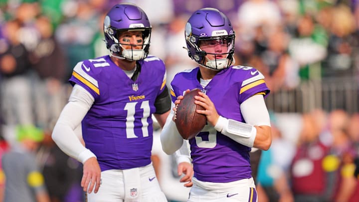 Oct 19, 2025; Minneapolis, Minnesota, USA; Minnesota Vikings quarterback Carson Wentz (11) warms up before the game against the Philadelphia Eagles at U.S. Bank Stadium.