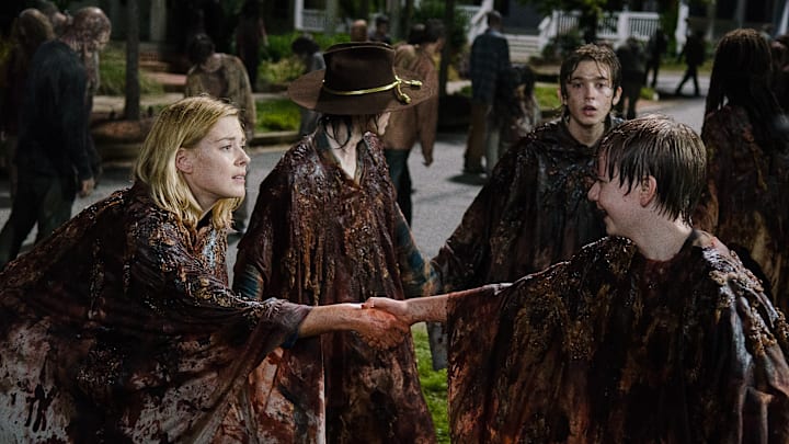 Chandler Riggs as Carl Grimes, Alexandra Breckenridge as Jessie Anderson, and Austin Abrams as Ron- The Walking Dead _ Season 6, Episode 9 - Photo Credit: Gene Page/AMC