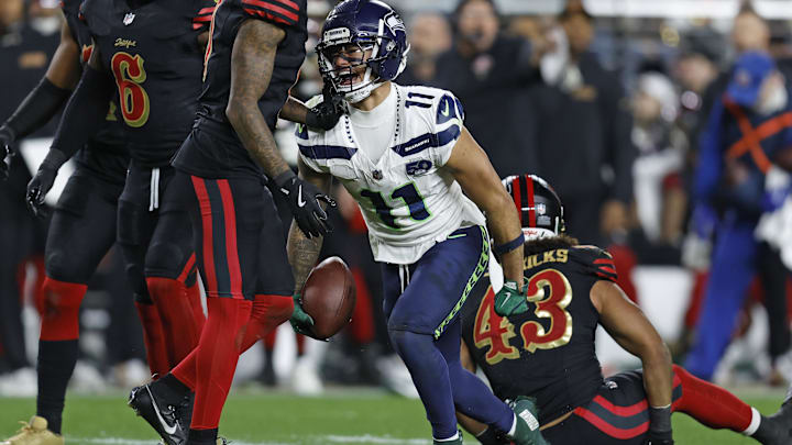 Seattle Seahawks wide receiver Jaxon Smith-Njigba (11) reacts after a catch.