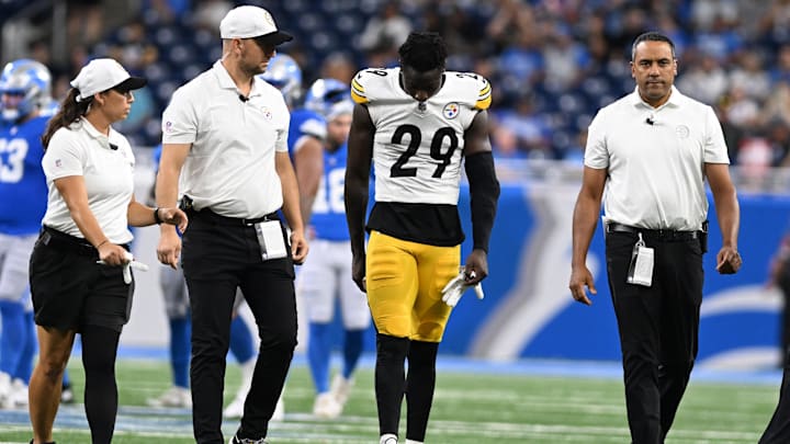 Aug 24, 2024; Detroit, Michigan, USA;  Pittsburgh Steelers cornerback Ryan Watts (29) walks off the field after being injured against the Detroit Lions late in the fourth quarter at Ford Field. Mandatory Credit: Lon Horwedel-Imagn Images