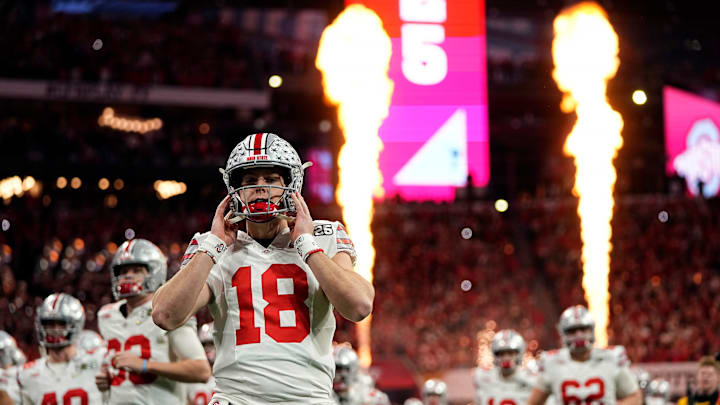 Ohio State Buckeyes quarterback Will Howard (18) take the field for the start of the game against Notre Dame Fighting Irish during the College Football Playoff National Championship at Mercedes-Benz Stadium in Atlanta on January 20, 2025.