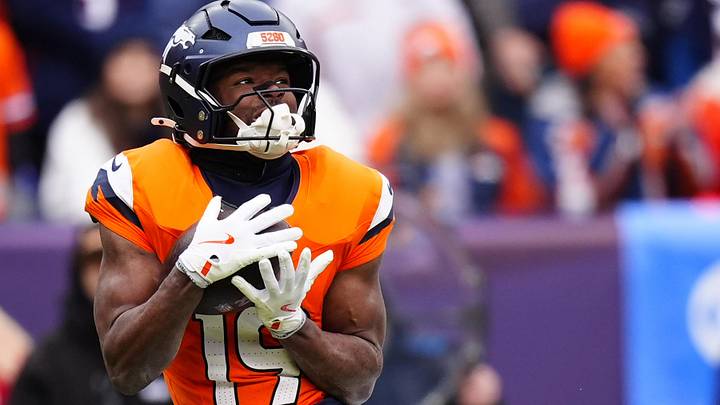 Jan 25, 2026; Denver, CO, USA; Denver Broncos wide receiver Marvin Mims Jr. (19) makes a catch against the New England Patriots during the first half in the 2026 AFC Championship Game at Empower Field at Mile High. Mandatory Credit: Ron Chenoy-Imagn Images