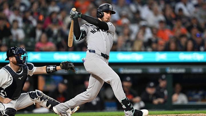 New York Yankees left fielder Cody Bellinger (35) hits a double against the Detroit Tigers in the ninth inning at Comerica Park. New York Yankees left fielder Cody Bellinger (35) hits a double against the Detroit Tigers in the ninth inning at Comerica Park.