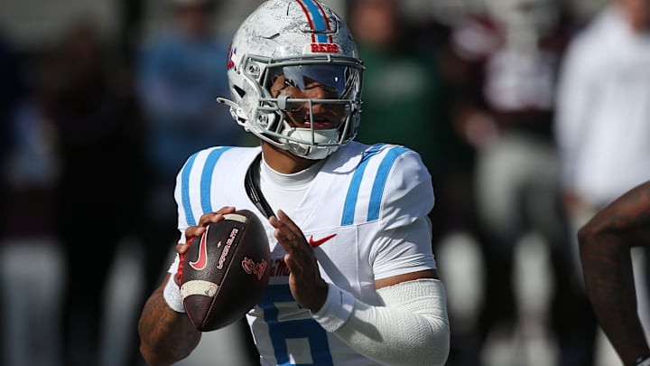Nov 28, 2025; Starkville, Mississippi, USA; Mississippi Rebels quarterback Trinidad Chambliss (6) looks to pass against the Mississippi State Bulldogs in the first half at Davis Wade Stadium at Scott Field. Mandatory Credit: Petre Thomas-Imagn Images
