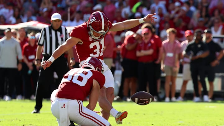 Oct 4, 2025; Tuscaloosa, Alabama, USA; Alabama Crimson Tide kicker Conor Talty (31) kicks the ball during the second quarter against the Vanderbilt Commodores at Saban Field at Bryant-Denny Stadium. 