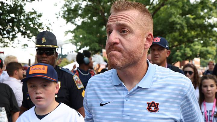Sep 12, 2026; Auburn, Alabama, USA;  Auburn Tigers head coach Alex Golesh and his son, Barrett, go through Tiger Walk before the game Southern Mississippi Golden Eagles at Jordan-Hare Stadium.  Mandatory Credit: John Reed-Imagn Images