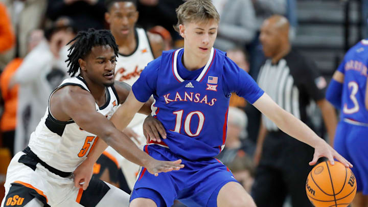 Oklahoma State Cowboys guard John-Michael Wright (51) defends Kansas Jayhawks guard Johnny Furphy