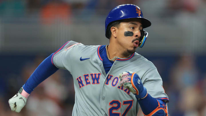 New York Mets designated hitter Mark Vientos (27) runs toward first base after hitting a single against the Miami Marlins during the sixth inning at loanDepot Park. 