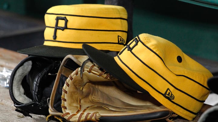 Pittsburgh Pirates hats and gloves in the dugout against the Philadelphia Phillies during the fifth inning at PNC Park. Pittsburgh won 5-1. Pittsburgh Pirates hats and gloves in the dugout against the Philadelphia Phillies during the fifth inning at PNC Park. Pittsburgh won 5-1.