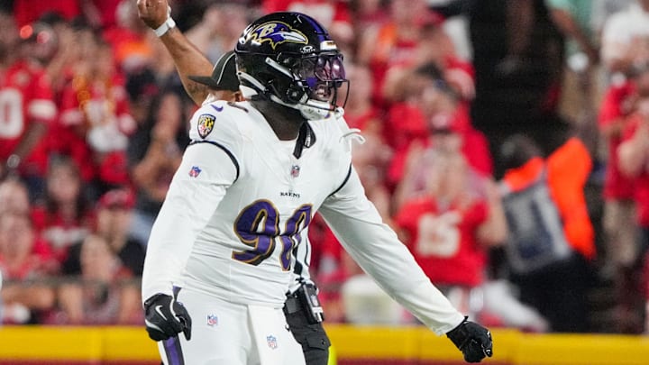 Sep 5, 2024; Kansas City, Missouri, USA; Baltimore Ravens linebacker David Ojabo (90) celebrates after a sack against the Kansas City Chiefs during the first half at GEHA Field at Arrowhead Stadium. Mandatory Credit: Denny Medley-Imagn Images