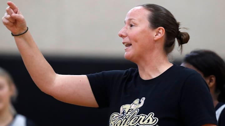 Purdue Boilermakers head coach Katie Gearlds yells down the court. Purdue Boilermakers head coach Katie Gearlds yells down the court.