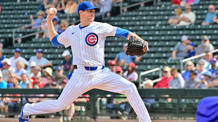 Feb 27, 2024; Mesa, Arizona, USA;  Chicago Cubs starting pitcher Kyle Hendricks (28) throws in the
