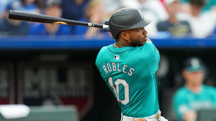 Seattle Mariners left fielder Victor Robles hits an RBI double against the Kansas City Royals in June at Kauffman Stadium. Seattle Mariners left fielder Victor Robles hits an RBI double against the Kansas City Royals in June at Kauffman Stadium.