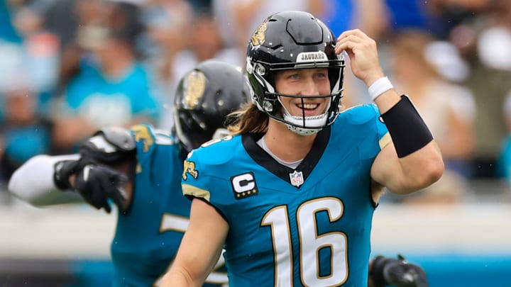 Jacksonville Jaguars quarterback Trevor Lawrence (16) smiles after wide receiver Christian Kirk (13), not shown, caught a reception during the fourth quarter of an NFL football matchup Sunday, Oct. 6, 2024 at EverBank Stadium in Jacksonville, Fla. The Jaguars edged the Colts on a field goal 37-34. [Corey Perrine/Florida Times-Union]