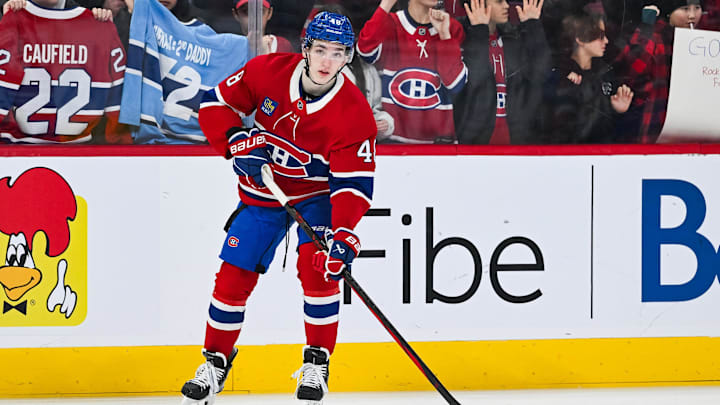 Jan 19, 2025; Montreal, Quebec, CAN; Montreal Canadiens defenseman Lane Hutson (48) skates with a puck during warm-up before the game against the New York Rangers at Bell Centre. Mandatory Credit: David Kirouac-Imagn Images
