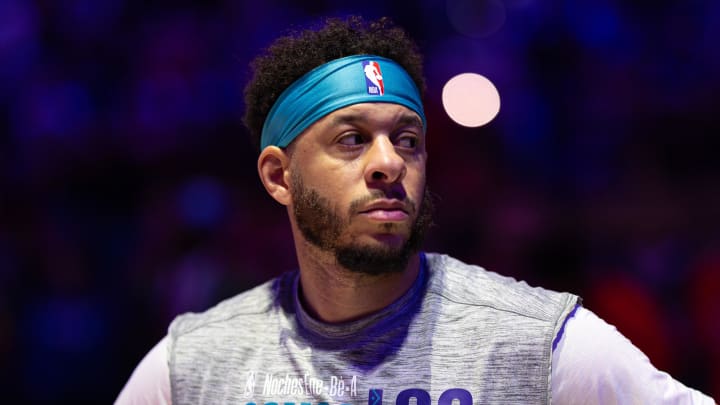 Mar 1, 2024; Philadelphia, Pennsylvania, USA; Charlotte Hornets guard Seth Curry stands for the anthem before action against the Philadelphia 76ers at Wells Fargo Center. Mandatory Credit: Bill Streicher-USA TODAY Sports