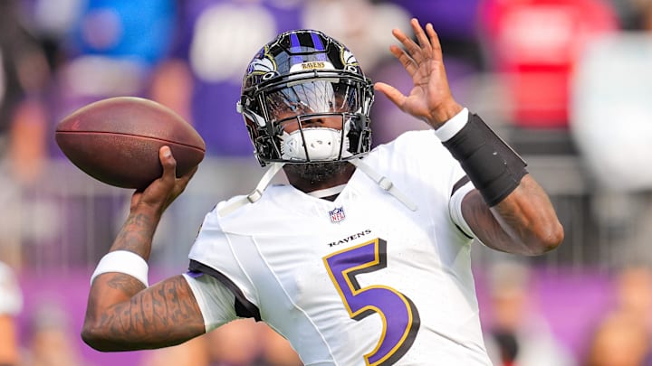 Nov 9, 2025; Minneapolis, Minnesota, USA; Baltimore Ravens quarterback Tyler Huntley (5) warms up before the game against the Minnesota Vikings at U.S. Bank Stadium. Mandatory Credit: Brad Rempel-Imagn Images