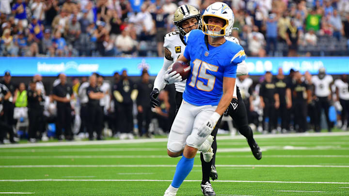 Oct 27, 2024; Inglewood, California, USA; Los Angeles Chargers wide receiver Ladd McConkey (15) runs the ball for a touchdown against the New Orleans Saints during the second half at SoFi Stadium. Mandatory Credit: Gary A. Vasquez-Imagn Images