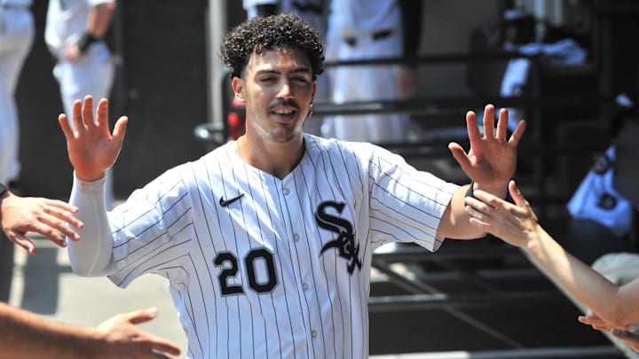 Chicago White Sox first baseman Miguel Vargas (20) celebrates with teammates against the Arizona Diamondbacks at Rate Field. 
