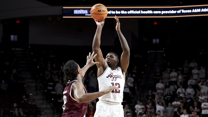 Texas A&M Aggies forward Rashaun Agee (12) shoots the ball over Texas Southern Tigers forward Anthony Andrews (8) during the first half at Reed Arena. Texas A&M Aggies forward Rashaun Agee (12) shoots the ball over Texas Southern Tigers forward Anthony Andrews (8) during the first half at Reed Arena.