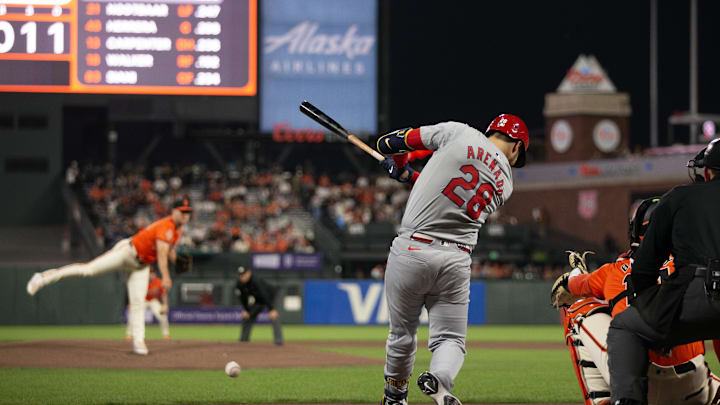 Sep 27, 2024; San Francisco, California, USA; St. Louis Cardinals third baseman Nolan Arenado (28) hits an RBI single off San Francisco Giants starting pitcher Landen Roupp (65) during the first inning at Oracle Park. Mandatory Credit: D. Ross Cameron-Imagn Images Sep 27, 2024; San Francisco, California, USA; St. Louis Cardinals third baseman Nolan Arenado (28) hits an RBI single off San Francisco Giants starting pitcher Landen Roupp (65) during the first inning at Oracle Park. Mandatory Credit: D. Ross Cameron-Imagn Images
