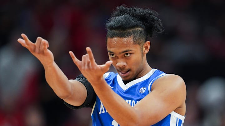 Kentucky Wildcats guard Jaland Lowe (15) celebrates his score in the first half during the UofL-UK annual rivalry game at the KFC Yum! Center in Louisville, Kentucky Nov. 11, 2025.