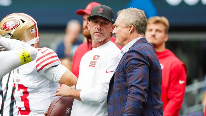 Sep 7, 2025; Seattle, Washington, USA; San Francisco 49ers general manager John Lynch, right, talks with head coach Kyle Shanahan during pregame warmups against the Seattle Seahawks at Lumen Field. Mandatory Credit: Joe Nicholson-Imagn Images Sep 7, 2025; Seattle, Washington, USA; San Francisco 49ers general manager John Lynch, right, talks with head coach Kyle Shanahan during pregame warmups against the Seattle Seahawks at Lumen Field. Mandatory Credit: Joe Nicholson-Imagn Images