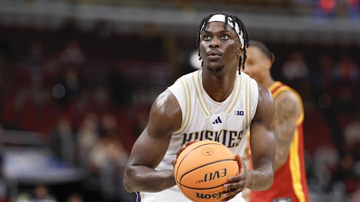 Mar 11, 2026; Chicago, IL, USA; Washington Huskies guard Zoom Diallo (5) shoots a free throw against the Southern California Trojans during the overtime at United Center. Mandatory Credit: Kamil Krzaczynski-Imagn Images