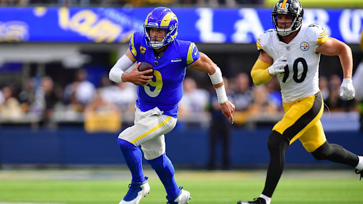 Oct 22, 2023; Inglewood, California, USA; Los Angeles Rams quarterback Matthew Stafford (9) runs the ball ahead of Pittsburgh Steelers linebacker T.J. Watt (90) during the second half at SoFi Stadium. Mandatory Credit: Gary A. Vasquez-Imagn Images Oct 22, 2023; Inglewood, California, USA; Los Angeles Rams quarterback Matthew Stafford (9) runs the ball ahead of Pittsburgh Steelers linebacker T.J. Watt (90) during the second half at SoFi Stadium. Mandatory Credit: Gary A. Vasquez-Imagn Images