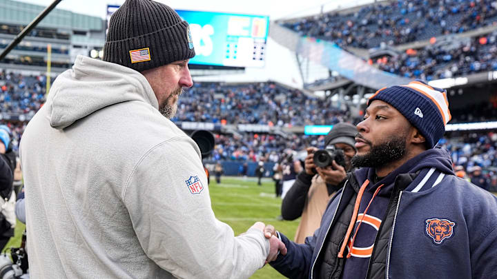 Dan Campbell of the Lions greets former Bears interim coach Thomas Brown after Detroit's win in December. Dan Campbell of the Lions greets former Bears interim coach Thomas Brown after Detroit's win in December.