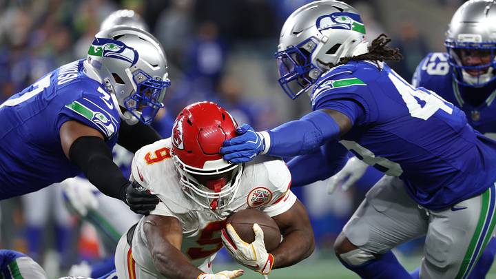 Oct 25, 2026; Seattle, Washington, USA; Seattle Seahawks linebacker Uchenna Nwosu (7) and linebacker Tyrice Knight (48) tackle Kansas City Chiefs running back Kenneth Walker III (9) during the third quarter at Lumen Field. Mandatory Credit: Joe Nicholson-Imagn Images Oct 25, 2026; Seattle, Washington, USA; Seattle Seahawks linebacker Uchenna Nwosu (7) and linebacker Tyrice Knight (48) tackle Kansas City Chiefs running back Kenneth Walker III (9) during the third quarter at Lumen Field. Mandatory Credit: Joe Nicholson-Imagn Images