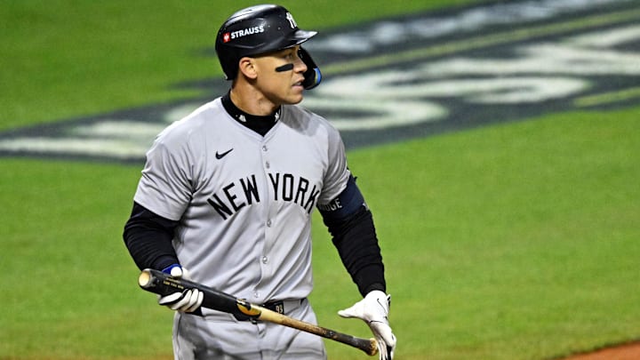 Oct 19, 2024; Cleveland, Ohio, USA; New York Yankees outfielder Aaron Judge (99) reacts after striking out during the third inning against the Cleveland Guardians during game five of the ALCS for the 2024 MLB playoffs at Progressive Field. Mandatory Credit: David Richard-Imagn Images