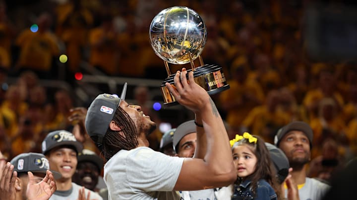 May 31, 2025; Indianapolis, Indiana, USA; Indiana Pacers center Myles Turner (33) raises the trophy after game six of the eastern conference finals against the New York Knicks for the 2025 NBA Playoffs at Gainbridge Fieldhouse. Mandatory Credit: Trevor Ruszkowski-Imagn Images May 31, 2025; Indianapolis, Indiana, USA; Indiana Pacers center Myles Turner (33) raises the trophy after game six of the eastern conference finals against the New York Knicks for the 2025 NBA Playoffs at Gainbridge Fieldhouse. Mandatory Credit: Trevor Ruszkowski-Imagn Images