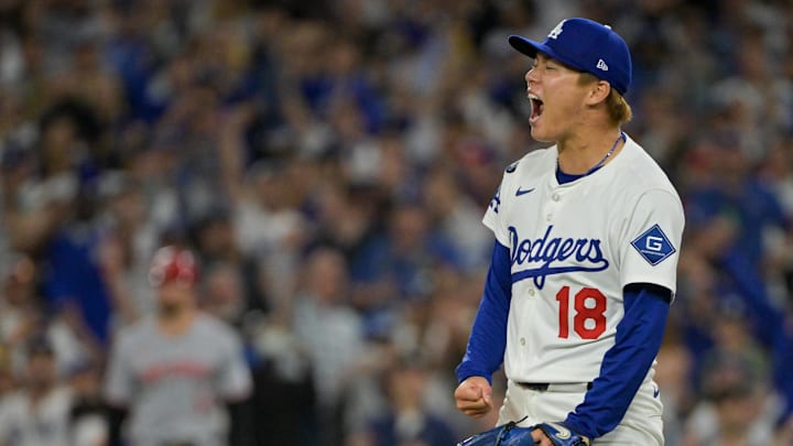 Oct 1, 2025; Los Angeles, California, USA; Los Angeles Dodgers starting pitcher Yoshinobu Yamamoto (18) celebrates after throwing against the Cincinnati Reds in the sixth inning during game two of the Wildcard round for the 2025 MLB playoffs at Dodger Stadium. Mandatory Credit: Jayne Kamin-Oncea-Imagn Images Oct 1, 2025; Los Angeles, California, USA; Los Angeles Dodgers starting pitcher Yoshinobu Yamamoto (18) celebrates after throwing against the Cincinnati Reds in the sixth inning during game two of the Wildcard round for the 2025 MLB playoffs at Dodger Stadium. Mandatory Credit: Jayne Kamin-Oncea-Imagn Images