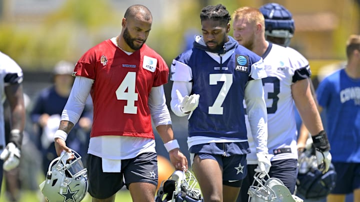 Jul 26, 2023; Oxnard, CA, USA; Dallas Cowboys quarterback Dak Prescott (4) talks with cornerback Jul 26, 2023; Oxnard, CA, USA; Dallas Cowboys quarterback Dak Prescott (4) talks with cornerback