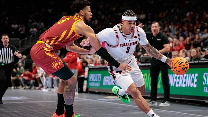 Mar 12, 2026; Kansas City, MO, USA; Texas Tech Red Raiders forward LeJuan Watts (3) drives around Iowa State Cyclones forward Joshua Jefferson (5) during the first half at T-Mobile Center. Mar 12, 2026; Kansas City, MO, USA; Texas Tech Red Raiders forward LeJuan Watts (3) drives around Iowa State Cyclones forward Joshua Jefferson (5) during the first half at T-Mobile Center.