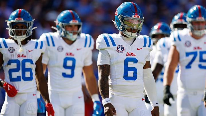 Mississippi Rebels quarterback Trinidad Chambliss walks off the field during a timeout against the Florida Gators during the first half at Ben Hill Griffin Stadium. Mandatory Credit: Matt Pendleton-Imagn Images Mississippi Rebels quarterback Trinidad Chambliss walks off the field during a timeout against the Florida Gators during the first half at Ben Hill Griffin Stadium. Mandatory Credit: Matt Pendleton-Imagn Images